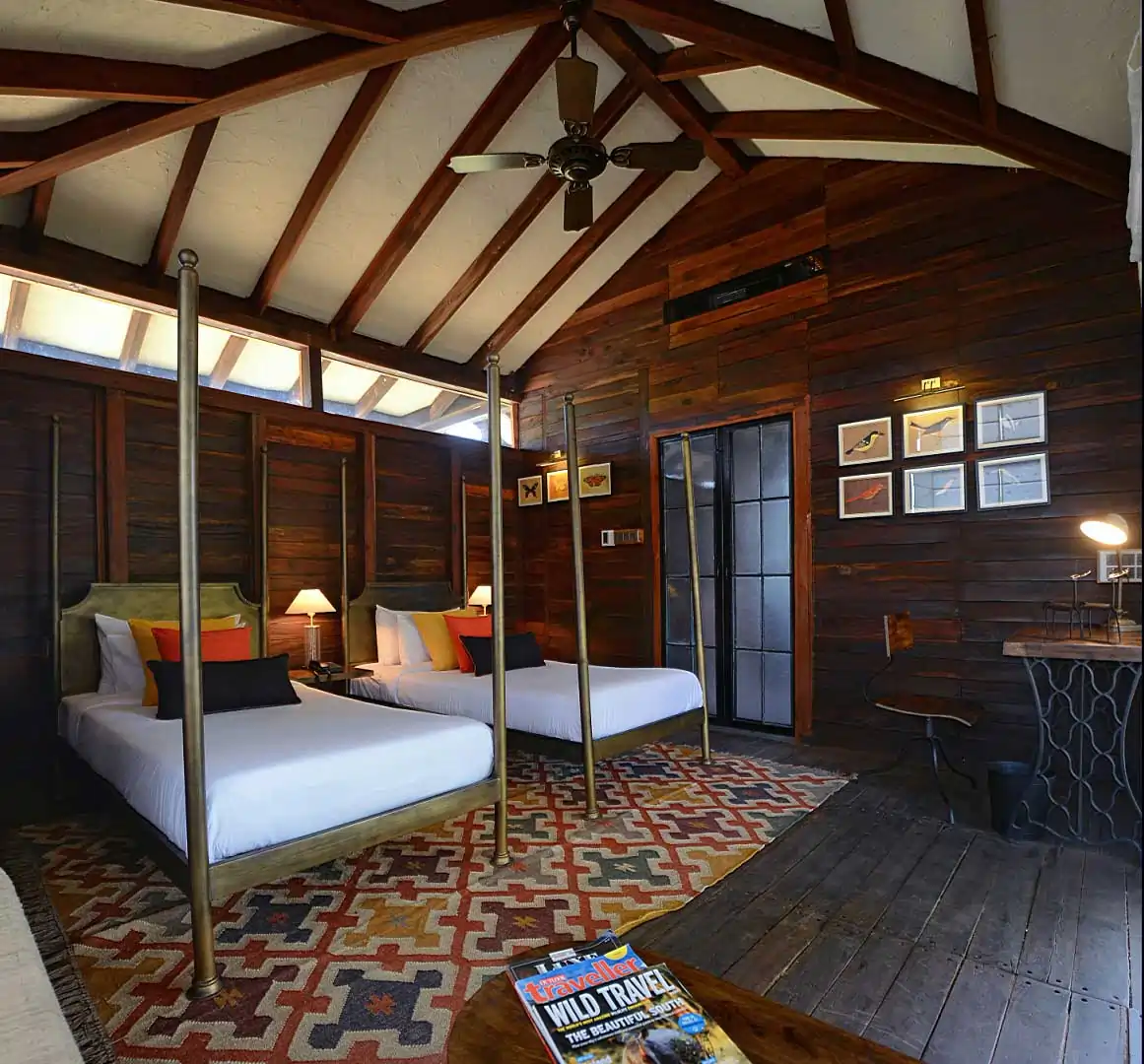 Tree house bedroom interior at Pench Tree Lodge