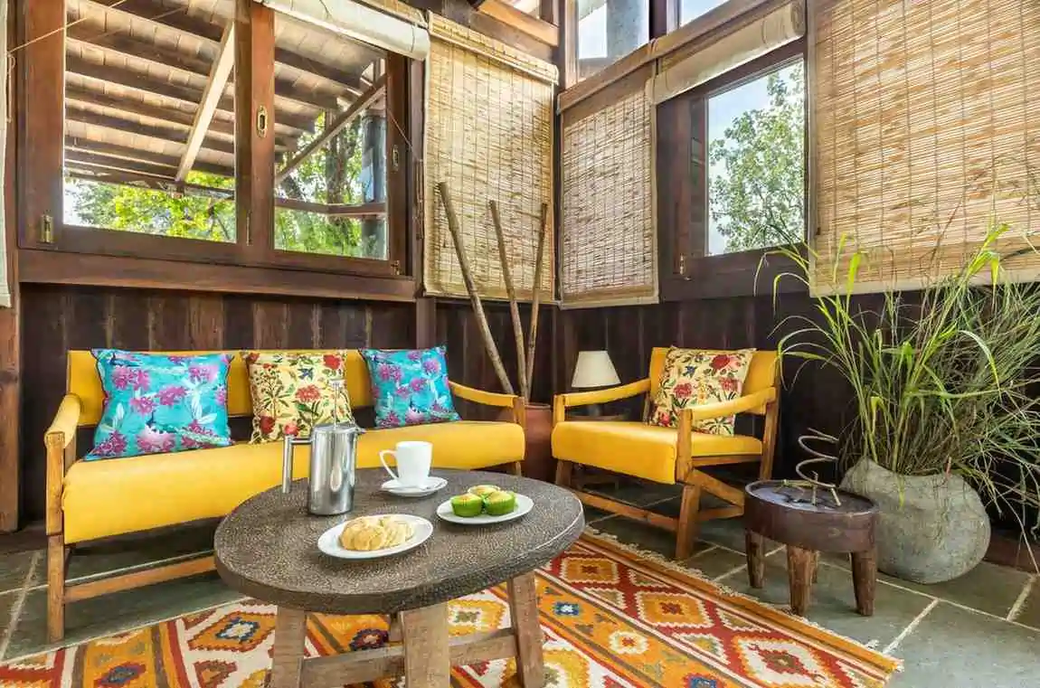 Lounge seating area at Pench Tree Lodge